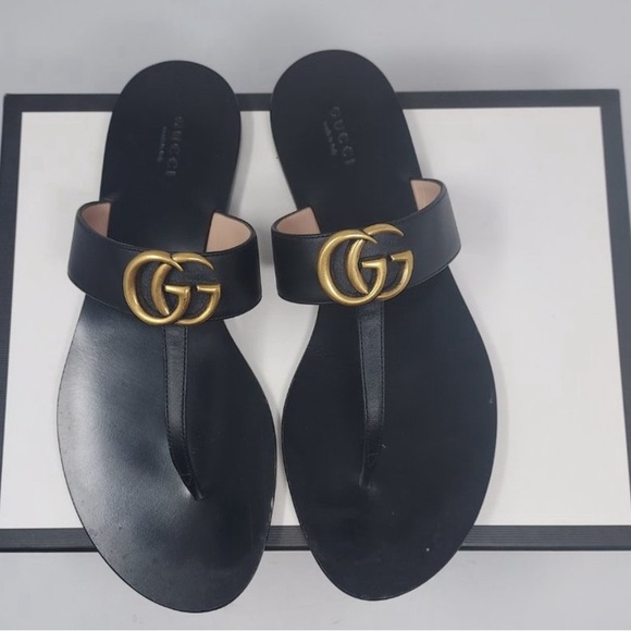 Gucci Shoes - Gucci EUC Sandals Size 37 1/2 black with gold GG